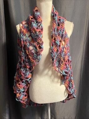 Hand crafted new, never worn, Circular Vest
